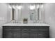 Elegant bathroom with a double vanity and marble countertops at 5909 Buttonwood Dr, Noblesville, IN 46062