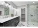 Modern bathroom with double vanity and a large walk-in shower at 5909 Buttonwood Dr, Noblesville, IN 46062