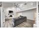 Open living area with loft, stone fireplace and hardwood floors at 5909 Buttonwood Dr, Noblesville, IN 46062