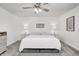 Main bedroom featuring a king-size bed and ceiling fan at 5909 Buttonwood Dr, Noblesville, IN 46062