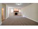 Spacious basement featuring a fireplace and carpet at 7290 Lockford Walk N, Avon, IN 46123