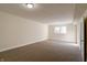 Finished basement with a window and neutral decor at 7290 Lockford Walk N, Avon, IN 46123