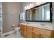 Bathroom with double vanity and large mirror at 7290 Lockford Walk N, Avon, IN 46123