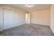Bright bedroom with neutral walls and carpet at 7290 Lockford Walk N, Avon, IN 46123