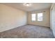 Well-lit bedroom featuring carpet and neutral walls at 7290 Lockford Walk N, Avon, IN 46123