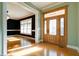 Spacious entryway with hardwood floors, a view of the dining room, and access to other rooms at 7290 Lockford Walk N, Avon, IN 46123