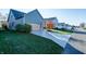 Attached garage with a spacious driveway at 7290 Lockford Walk N, Avon, IN 46123