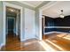 Bright hallway with hardwood floors and access to other rooms at 7290 Lockford Walk N, Avon, IN 46123