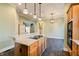 Island kitchen with granite countertops and a breakfast bar at 7290 Lockford Walk N, Avon, IN 46123