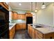 Eat-in kitchen with granite countertops, stainless steel appliances, and light wood cabinets at 7290 Lockford Walk N, Avon, IN 46123