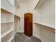 Large walk-in closet with ample shelving and hanging space at 7290 Lockford Walk N, Avon, IN 46123