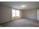 Bright bedroom with neutral walls, carpet, and a large window at 8391 Inland Dr, Avon, IN 46123