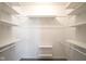 Spacious walk-in closet with ample shelving and hanging space at 8391 Inland Dr, Avon, IN 46123