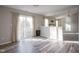 Bright dining area with hardwood floors and sliding glass doors to deck at 8391 Inland Dr, Avon, IN 46123