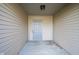 Gray front door leading into covered entryway at 8391 Inland Dr, Avon, IN 46123