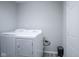 Laundry room with washer and dryer, and grey flooring at 8391 Inland Dr, Avon, IN 46123