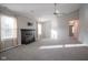 Living room with fireplace, high ceiling and carpet at 8391 Inland Dr, Avon, IN 46123