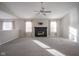 Spacious living room featuring a fireplace and vaulted ceiling at 8391 Inland Dr, Avon, IN 46123