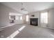 Open living room with a fireplace and kitchen view at 8391 Inland Dr, Avon, IN 46123