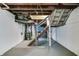 Unfinished basement with ample storage space and laundry hookups at 951 W 33Rd St, Indianapolis, IN 46208