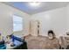 Spacious bedroom with neutral carpeting and large window at 951 W 33Rd St, Indianapolis, IN 46208