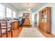 Dining room with hardwood floors, wooden hutch and desk at 951 W 33Rd St, Indianapolis, IN 46208
