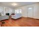 Living room with hardwood floors, fireplace, and two sofas at 951 W 33Rd St, Indianapolis, IN 46208