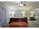 Spacious bedroom with wood flooring and large window at 1127 Grant Cir, Cicero, IN 46034