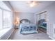 Bedroom with mirrored closet doors and carpet at 1127 Grant Cir, Cicero, IN 46034