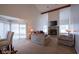 Spacious living room with stone fireplace and patio access at 1127 Grant Cir, Cicero, IN 46034