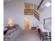 Open living area showcasing a staircase to an upper loft at 1127 Grant Cir, Cicero, IN 46034