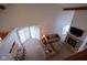 Open living area with vaulted ceiling, stone fireplace, and patio doors at 1127 Grant Cir, Cicero, IN 46034
