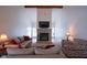 Spacious living room features a stone fireplace, vaulted ceilings, and ample natural light at 1127 Grant Cir, Cicero, IN 46034