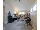 Home music studio with instruments, desk, and built-in shelving at 1127 Grant Cir, Cicero, IN 46034