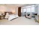 Spacious bedroom with balcony access and city views at 429 N Pennsylvania N St # 804, Indianapolis, IN 46204