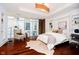 Spacious bedroom with a wall bed and hardwood floors at 429 N Pennsylvania N St # 804, Indianapolis, IN 46204