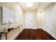 Spacious entryway with dark hardwood floors and contemporary art at 429 N Pennsylvania N St # 804, Indianapolis, IN 46204