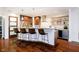 Modern kitchen with stainless steel appliances and granite countertops at 429 N Pennsylvania N St # 804, Indianapolis, IN 46204