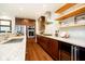 Modern kitchen with stainless steel appliances and granite countertops at 429 N Pennsylvania N St # 804, Indianapolis, IN 46204