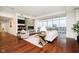 Bright living room with city views and a stone fireplace at 429 N Pennsylvania N St # 804, Indianapolis, IN 46204