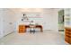 Home office features a curved desk and built-in shelves at 429 N Pennsylvania N St # 804, Indianapolis, IN 46204