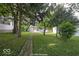 Landscaped backyard with a stone pathway at 1519 E Mills Ave, Indianapolis, IN 46227