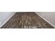 Dark gray wood-look vinyl flooring at 1519 E Mills Ave, Indianapolis, IN 46227