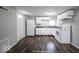 Efficient kitchen with white cabinets and modern appliances at 1519 E Mills Ave, Indianapolis, IN 46227