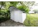 White storage shed in backyard at 1519 E Mills Ave, Indianapolis, IN 46227