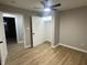 Simple bedroom with ceiling fan, vinyl plank flooring, and closet at 706 W Franklin St, Thorntown, IN 46071