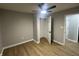 Spacious bedroom with wood-look floors and closet at 706 W Franklin St, Thorntown, IN 46071