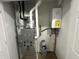 Utility room with HVAC and water heater at 706 W Franklin St, Thorntown, IN 46071