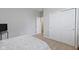 Simple bedroom with a double bed and spacious closet at 325 Milltown Dr, Pendleton, IN 46064