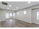 Spacious living room with hardwood floors and lots of natural light at 802 N Tuxedo St, Indianapolis, IN 46201